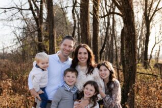 Dr. Jay Burton and his family Dr. Jay Burton with his wife and four children outdoors
